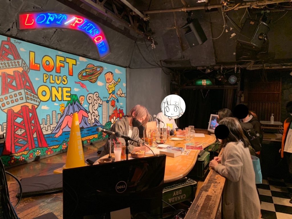 Visitors gathering for the post-event signing session